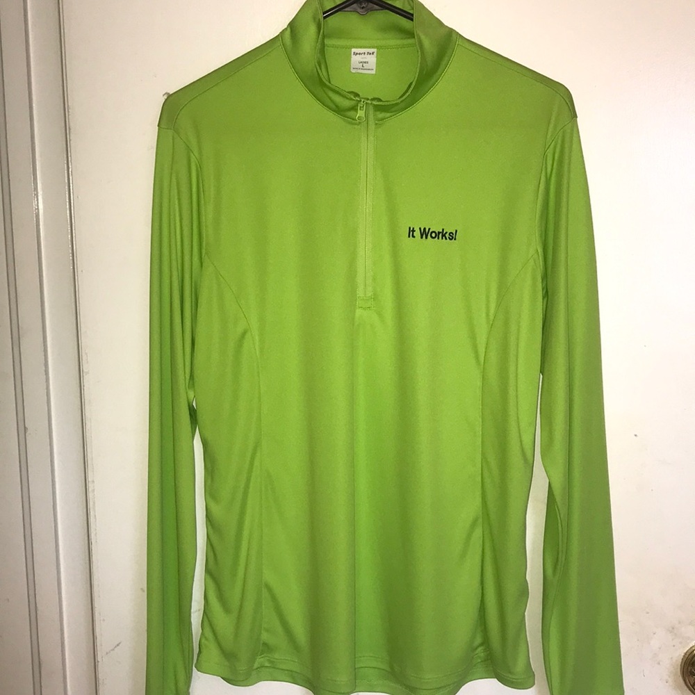 It Works! Long sleeve sport material top.